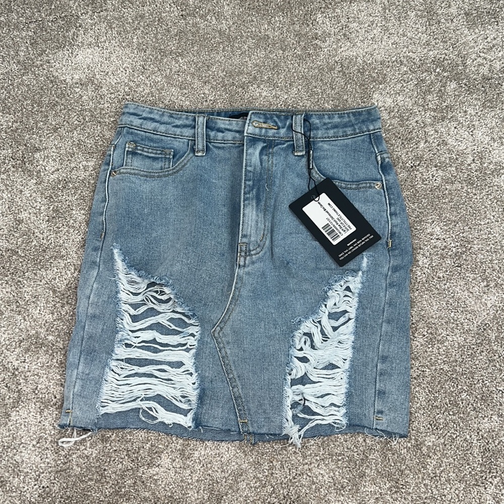 PrettyLittleThing Light Blue Wash Ripped Mini Denim Skirt